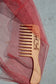 Wooden wide tooth conditioning comb