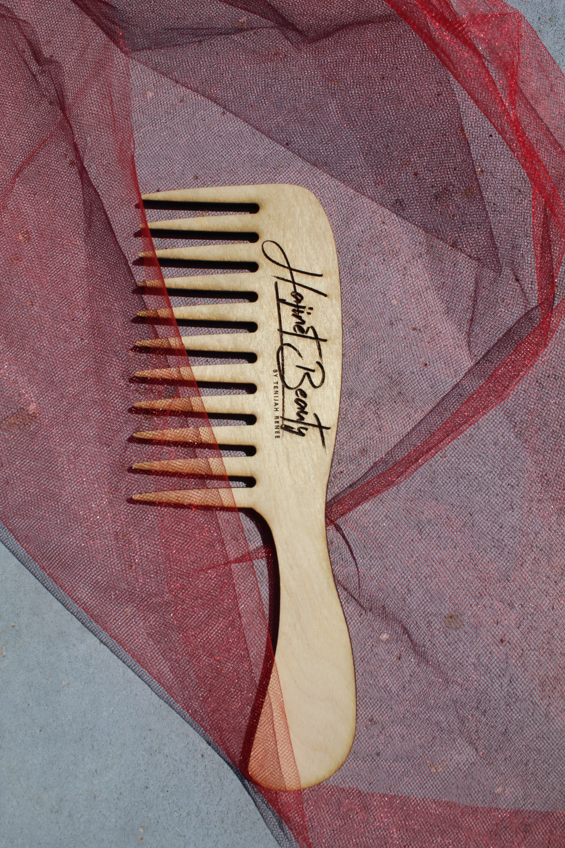 Wooden wide tooth conditioning comb
